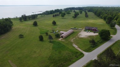 Beautiful 9 hole golf course on 57 acres with 2000 feet of on Nahma Club in Michigan - for sale on GolfHomes.com, golf home, golf lot