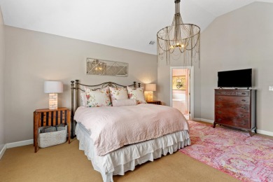 Full of charm and nestled in a quiet cul-de-sac, this 4-bedroom on West Lake Country Club in Georgia - for sale on GolfHomes.com, golf home, golf lot