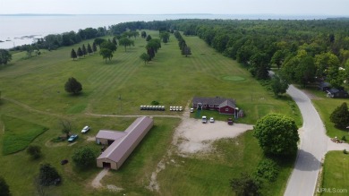 Beautiful 9 hole golf course on 57 acres with 2000 feet of on Nahma Club in Michigan - for sale on GolfHomes.com, golf home, golf lot