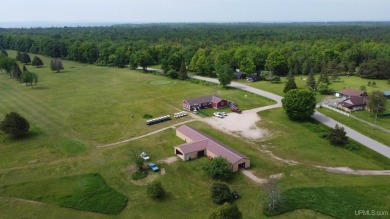 Beautiful 9 hole golf course on 57 acres with 2000 feet of on Nahma Club in Michigan - for sale on GolfHomes.com, golf home, golf lot