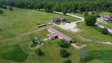 Beautiful 9 hole golf course on 57 acres with 2000 feet of on Nahma Club in Michigan - for sale on GolfHomes.com, golf home, golf lot