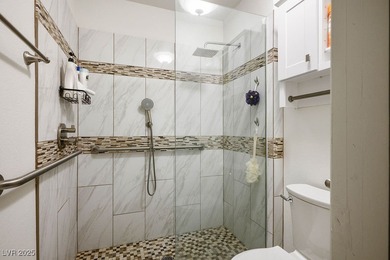 This exquisite home is perfect for those who adore both indoor & on Highland Falls Golf Club in Nevada - for sale on GolfHomes.com, golf home, golf lot