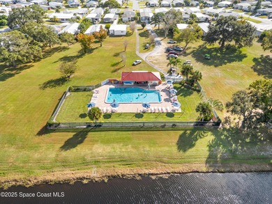 Welcome to your dream home in Barefoot Bay! This spacious on Barefoot Bay Golf Course in Florida - for sale on GolfHomes.com, golf home, golf lot