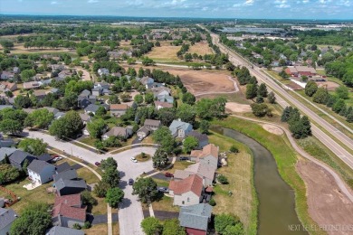 Don't miss this beautifully updated 4-bedroom home located in a on Orchard Valley Golf Course in Illinois - for sale on GolfHomes.com, golf home, golf lot