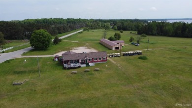 Beautiful 9 hole golf course on 57 acres with 2000 feet of on Nahma Club in Michigan - for sale on GolfHomes.com, golf home, golf lot