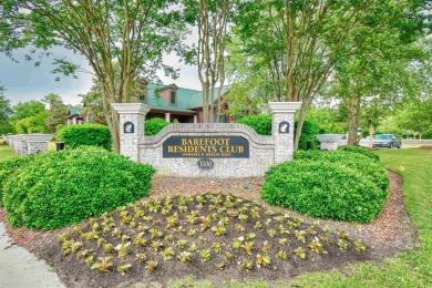 Experience luxury living in this recently updated home on Barefoot Resort and Golf Club  in South Carolina - for sale on GolfHomes.com, golf home, golf lot