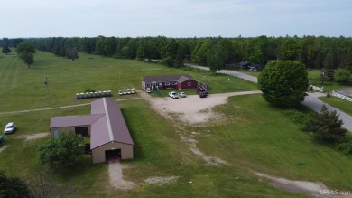 Beautiful 9 hole golf course on 57 acres with 2000 feet of on Nahma Club in Michigan - for sale on GolfHomes.com, golf home, golf lot