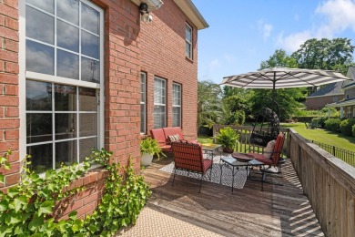 Full of charm and nestled in a quiet cul-de-sac, this 4-bedroom on West Lake Country Club in Georgia - for sale on GolfHomes.com, golf home, golf lot