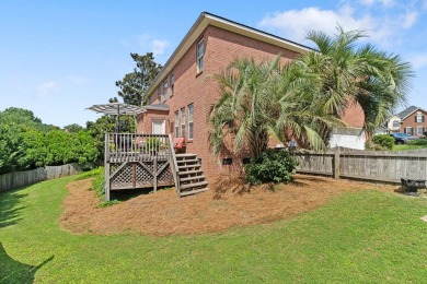 Full of charm and nestled in a quiet cul-de-sac, this 4-bedroom on West Lake Country Club in Georgia - for sale on GolfHomes.com, golf home, golf lot