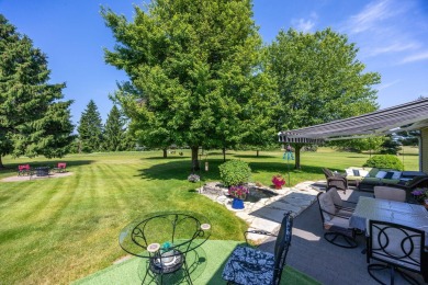 Enjoy stunning golf course views from this meticulously on Canadian Lakes Country Club-The Royal Course in Michigan - for sale on GolfHomes.com, golf home, golf lot