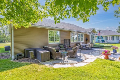 Enjoy stunning golf course views from this meticulously on Canadian Lakes Country Club-The Royal Course in Michigan - for sale on GolfHomes.com, golf home, golf lot