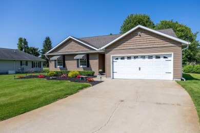 Enjoy stunning golf course views from this meticulously on Canadian Lakes Country Club-The Royal Course in Michigan - for sale on GolfHomes.com, golf home, golf lot