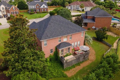 Full of charm and nestled in a quiet cul-de-sac, this 4-bedroom on West Lake Country Club in Georgia - for sale on GolfHomes.com, golf home, golf lot