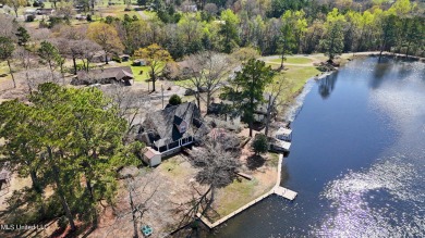 Welcome Home! This beautiful home sits high and dry on lake that on The Kings Arrow Ranch in Mississippi - for sale on GolfHomes.com, golf home, golf lot