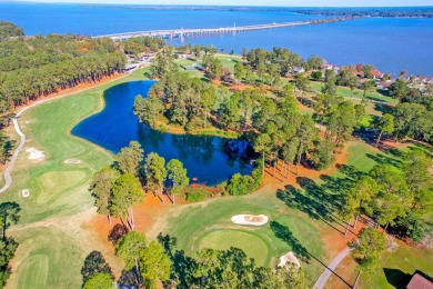 What an incredible find! Nestled on a spacious lot along Hole 12 on Santee-Cooper Country Club in South Carolina - for sale on GolfHomes.com, golf home, golf lot