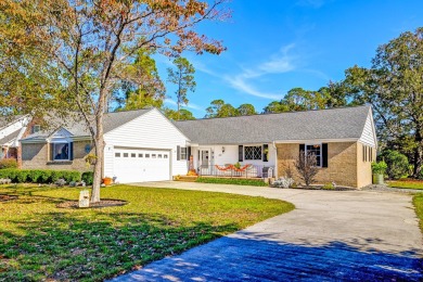 What an incredible find! Nestled on a spacious lot along Hole 12 on Santee-Cooper Country Club in South Carolina - for sale on GolfHomes.com, golf home, golf lot