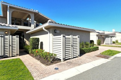 Located in the highly sought-after Harbour Oaks community on on Longboat Key Golf Club Resort in Florida - for sale on GolfHomes.com, golf home, golf lot