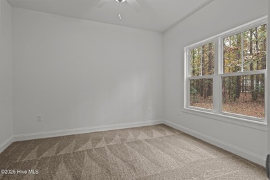 The seller is offering $15,000 to use as you choose. The on Woodlake Country Club in North Carolina - for sale on GolfHomes.com, golf home, golf lot