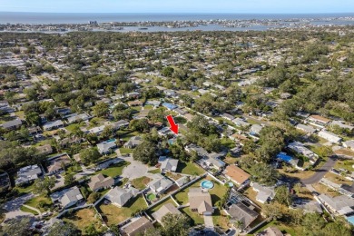 This beautifully updated three-bedroom, two-bathroom pool home on Largo Golf Course in Florida - for sale on GolfHomes.com, golf home, golf lot