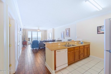 Discover Your Perfect Beachfront Escape! This stunning on Holiday Golf Club in Florida - for sale on GolfHomes.com, golf home, golf lot