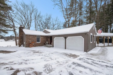 Welcome to this picturesque lakeside retreat, nestled on the on Spruce Ridge Golf Club in Michigan - for sale on GolfHomes.com, golf home, golf lot