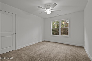 The seller is offering $15,000 to use as you choose. The on Woodlake Country Club in North Carolina - for sale on GolfHomes.com, golf home, golf lot