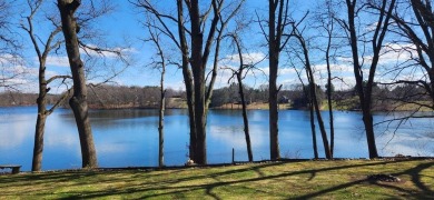 Welcome to this picturesque lakeside retreat, nestled on the on Spruce Ridge Golf Club in Michigan - for sale on GolfHomes.com, golf home, golf lot