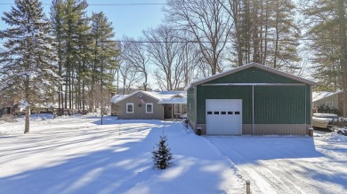 Welcome to this picturesque lakeside retreat, nestled on the on Spruce Ridge Golf Club in Michigan - for sale on GolfHomes.com, golf home, golf lot