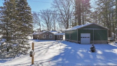 Welcome to this picturesque lakeside retreat, nestled on the on Spruce Ridge Golf Club in Michigan - for sale on GolfHomes.com, golf home, golf lot