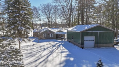 Welcome to this picturesque lakeside retreat, nestled on the on Spruce Ridge Golf Club in Michigan - for sale on GolfHomes.com, golf home, golf lot