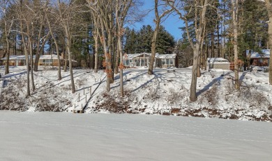 Welcome to this picturesque lakeside retreat, nestled on the on Spruce Ridge Golf Club in Michigan - for sale on GolfHomes.com, golf home, golf lot