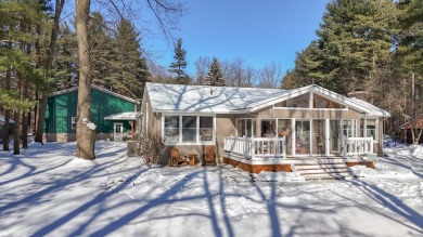 Welcome to this picturesque lakeside retreat, nestled on the on Spruce Ridge Golf Club in Michigan - for sale on GolfHomes.com, golf home, golf lot