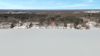 Welcome to this picturesque lakeside retreat, nestled on the on Spruce Ridge Golf Club in Michigan - for sale on GolfHomes.com, golf home, golf lot