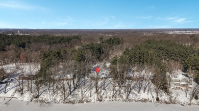 Welcome to this picturesque lakeside retreat, nestled on the on Spruce Ridge Golf Club in Michigan - for sale on GolfHomes.com, golf home, golf lot