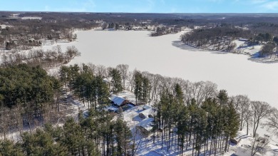 Welcome to this picturesque lakeside retreat, nestled on the on Spruce Ridge Golf Club in Michigan - for sale on GolfHomes.com, golf home, golf lot