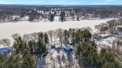 Welcome to this picturesque lakeside retreat, nestled on the on Spruce Ridge Golf Club in Michigan - for sale on GolfHomes.com, golf home, golf lot