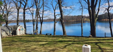 Welcome to this picturesque lakeside retreat, nestled on the on Spruce Ridge Golf Club in Michigan - for sale on GolfHomes.com, golf home, golf lot