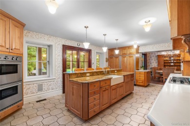 ROSLYN HARBOR; Timeless Brick Manor: Behind iron gates and a on Engineers Country Club in New York - for sale on GolfHomes.com, golf home, golf lot