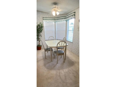 Look no further - Super clean fully furnished home that is move on Lily Lake Golf and RV Resort in Florida - for sale on GolfHomes.com, golf home, golf lot