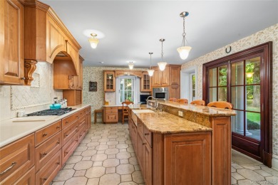ROSLYN HARBOR; Timeless Brick Manor: Behind iron gates and a on Engineers Country Club in New York - for sale on GolfHomes.com, golf home, golf lot