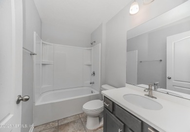 A Beautiful Chapter Begins in Samara Lakes - Upgraded Longwood on King and Bear Golf Course/World Golf Village in Florida - for sale on GolfHomes.com, golf home, golf lot