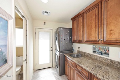 Gorgeous home located on the 8th tee box of Willowbrook Golf on Sun City-Willow Creek / Willow Brook  in Arizona - for sale on GolfHomes.com, golf home, golf lot