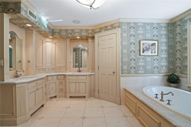 ROSLYN HARBOR; Timeless Brick Manor: Behind iron gates and a on Engineers Country Club in New York - for sale on GolfHomes.com, golf home, golf lot