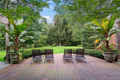ROSLYN HARBOR; Timeless Brick Manor: Behind iron gates and a on Engineers Country Club in New York - for sale on GolfHomes.com, golf home, golf lot