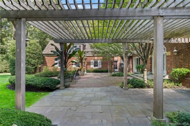 ROSLYN HARBOR; Timeless Brick Manor: Behind iron gates and a on Engineers Country Club in New York - for sale on GolfHomes.com, golf home, golf lot