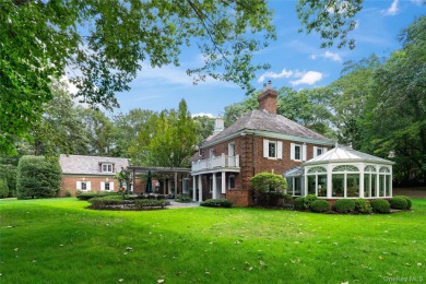 ROSLYN HARBOR; Timeless Brick Manor: Behind iron gates and a on Engineers Country Club in New York - for sale on GolfHomes.com, golf home, golf lot