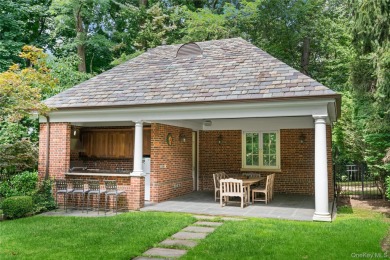 ROSLYN HARBOR; Timeless Brick Manor: Behind iron gates and a on Engineers Country Club in New York - for sale on GolfHomes.com, golf home, golf lot