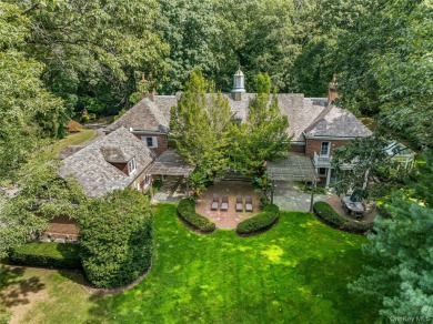 ROSLYN HARBOR; Timeless Brick Manor: Behind iron gates and a on Engineers Country Club in New York - for sale on GolfHomes.com, golf home, golf lot
