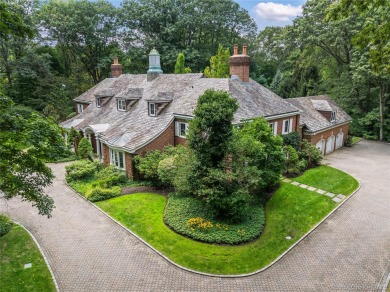 ROSLYN HARBOR; Timeless Brick Manor: Behind iron gates and a on Engineers Country Club in New York - for sale on GolfHomes.com, golf home, golf lot
