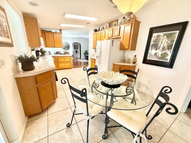 STUNNING 3-BEDROOM, 2-BATHROOM FULLY FURNISHED HOME IN A GATED on Cypress Greens in Florida - for sale on GolfHomes.com, golf home, golf lot